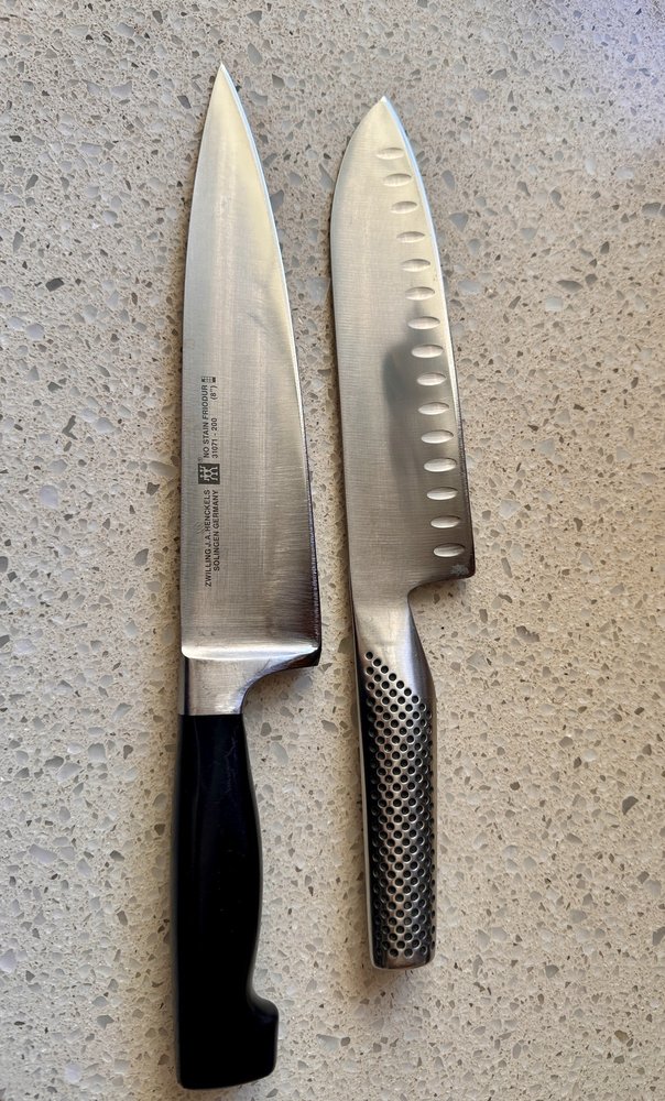 Freshly sharpened Zwilling J.A. Henckels chef knife and Global santoku